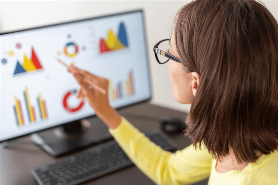 Business team leveraging customer data and analytics tools to drive growth through data-driven marketing strategies and informed decision-making.